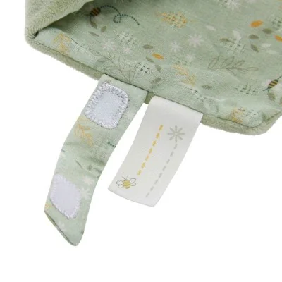 Doudou abeille vert avec étiquettes stimulantes et attache velcro