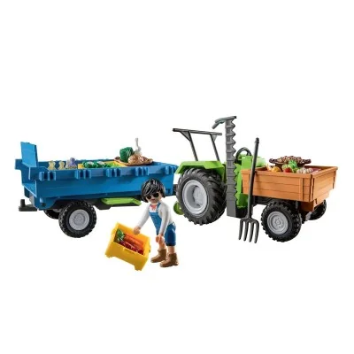 Playmobil tracteur vert avec remorque et figurine de fermier - transport de fruits et légumes fraîchement récoltés. Playmobil tracteur vert avec remorque et figurine de fermier - transport de fruits et légumes fraîchement récoltés.