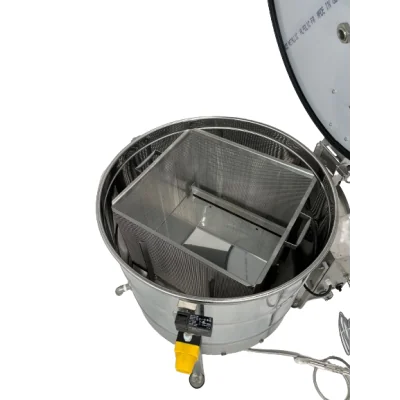 Intérieur de la chaudière centrifuge Fritz avec paniers et supports de cadres