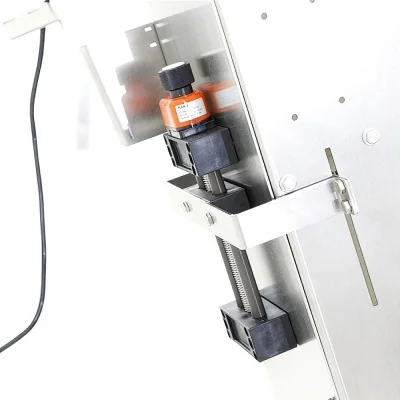 Détail du mécanisme de convoyage du distributeur automatique de capsules Swienty
