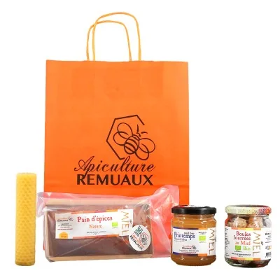 Sac orange Apiculture Remuaux avec produits au miel bio et bougie artisanale