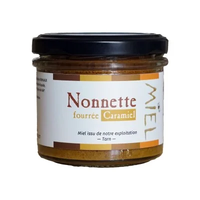 Nonnette fourrée au Caramiel Apiculture Remuaux, pâtisserie au miel en pot de verre de 55g. Nonnette fourrée au Caramiel Apiculture Remuaux, pâtisserie au miel en pot de verre de 55g.